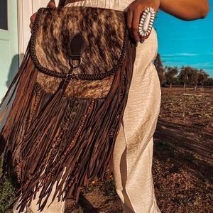 Haute Southern Hyde by Beth Marie “ The Elva “ Cowhide Fringe Leather Purse